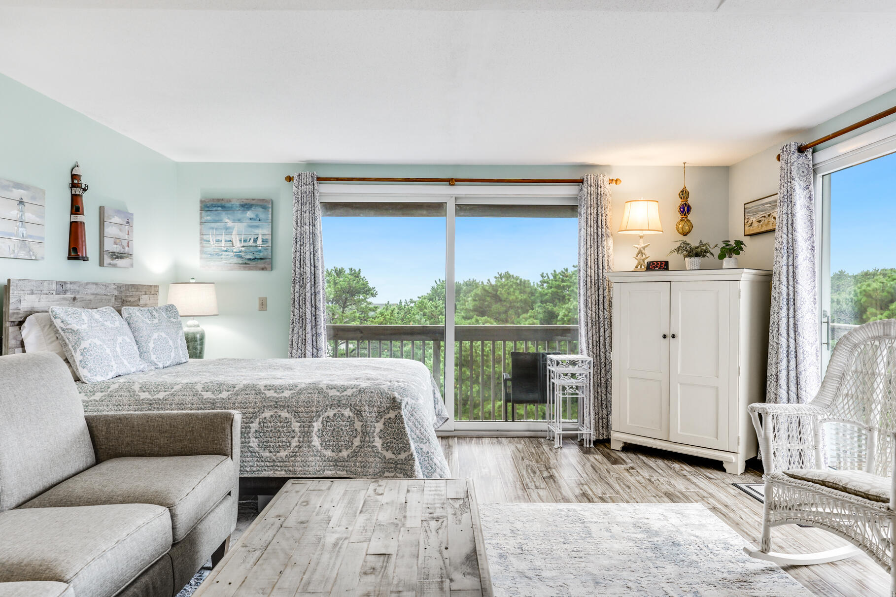 132 Shore Road, Unit 30 Truro, MA 02666 - Photo 28 of 32 a living room with furniture and a large window