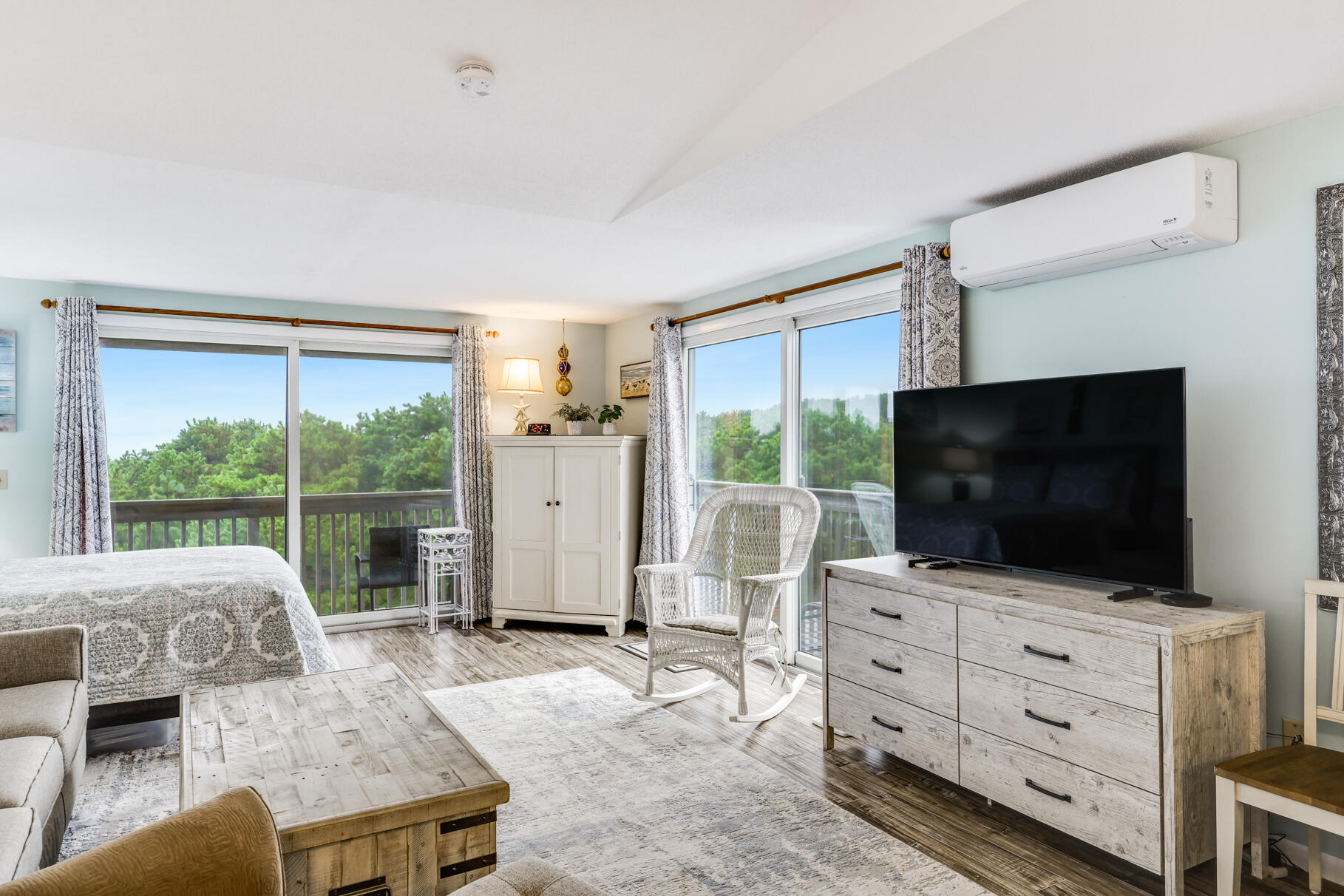 132 Shore Road, Unit 30 Truro, MA 02666 - Photo 30 of 32 a living room with furniture and a flat screen tv