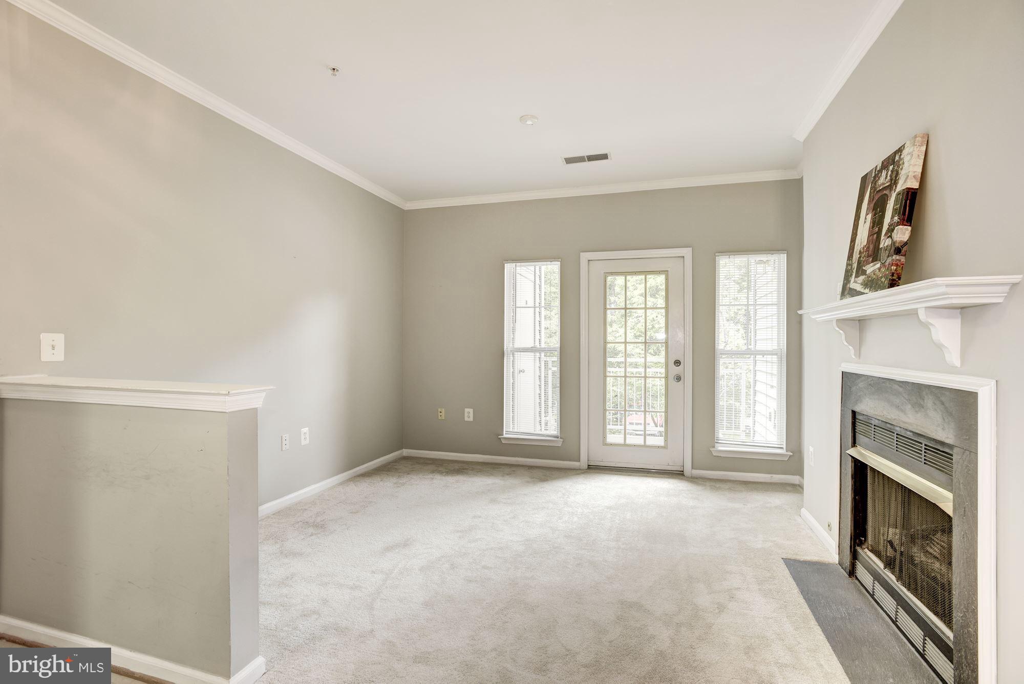 1516 North Point Drive, Unit 103 Reston, VA 20194 - Photo 7 of 44 gas fireplace