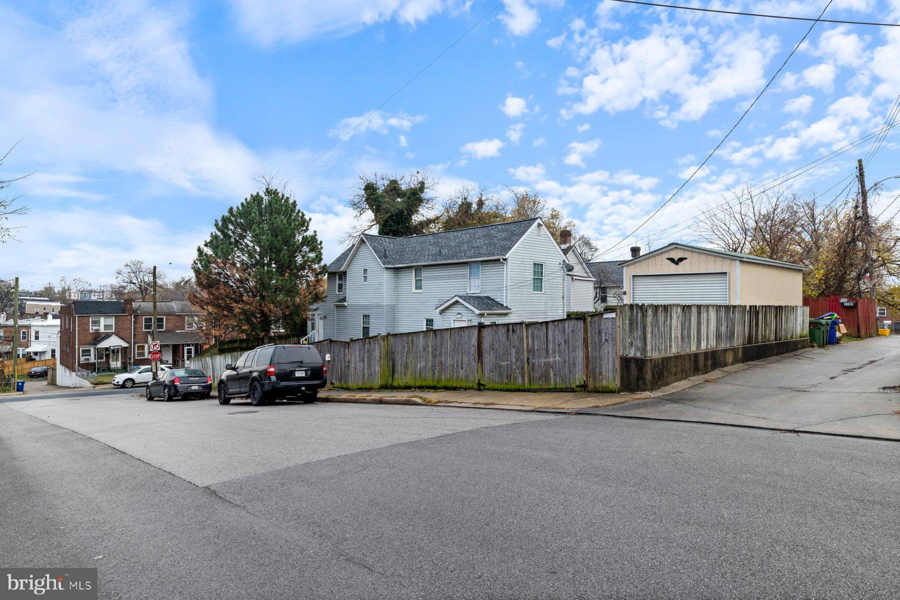 3700 7th Street Baltimore, MD 21225 - Photo 2 of 25 a view of street with parked cars