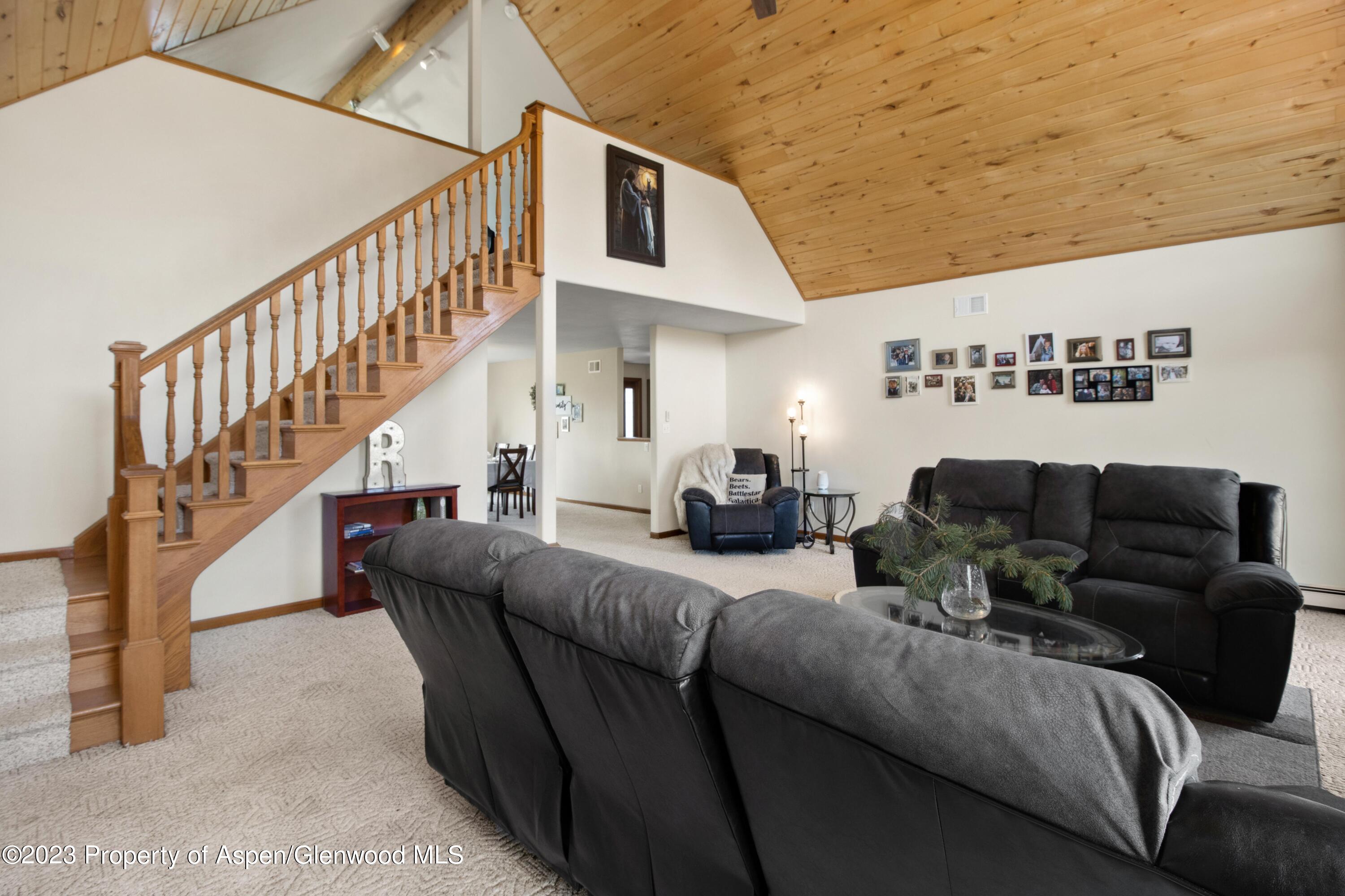 1840 County Road 293 Rifle, CO 81650 - Photo 13 of 27 a living room with furniture and stairs