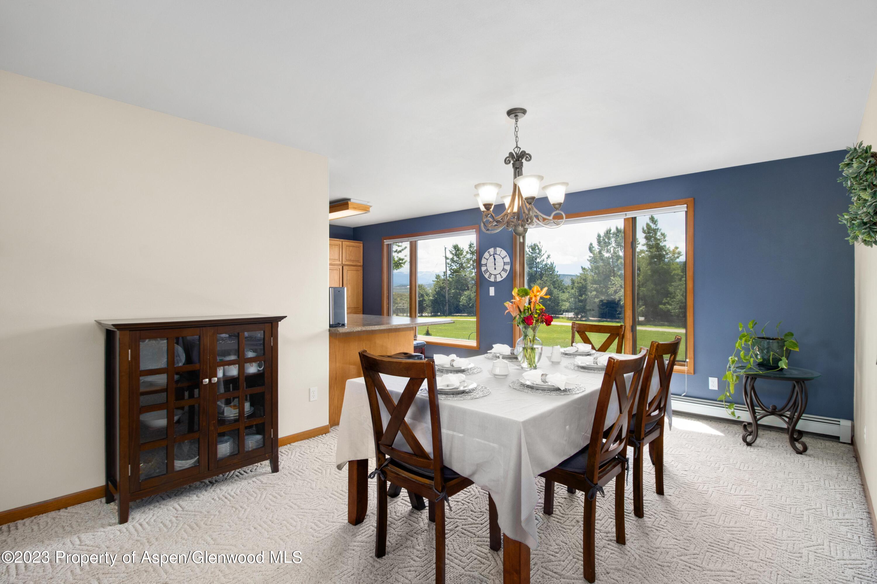 1840 County Road 293 Rifle, CO 81650 - Photo 14 of 27 a view of a dining room with furniture window and outside view
