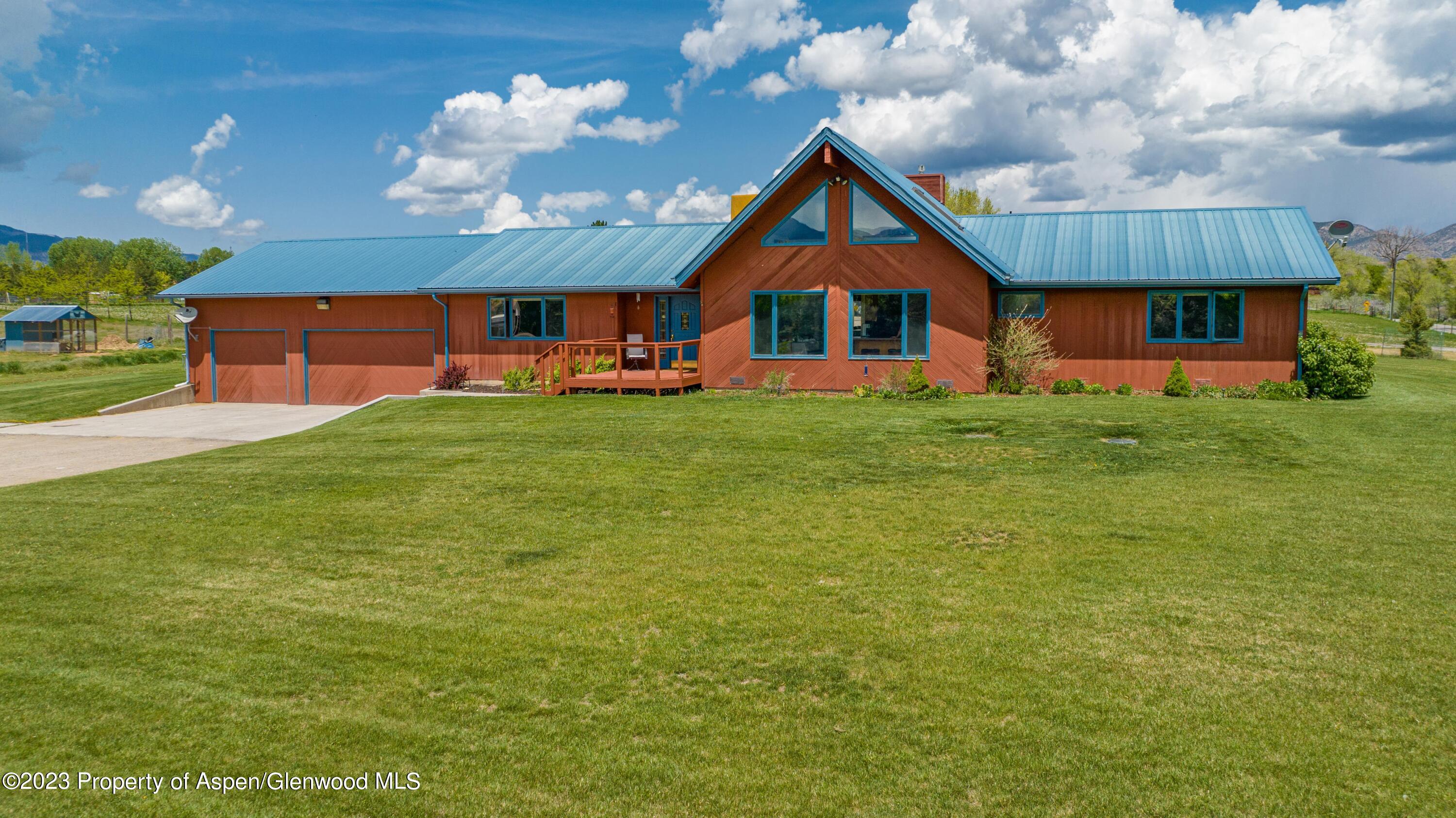 1840 County Road 293 Rifle, CO 81650 - Photo 2 of 27 a front view of house with yard