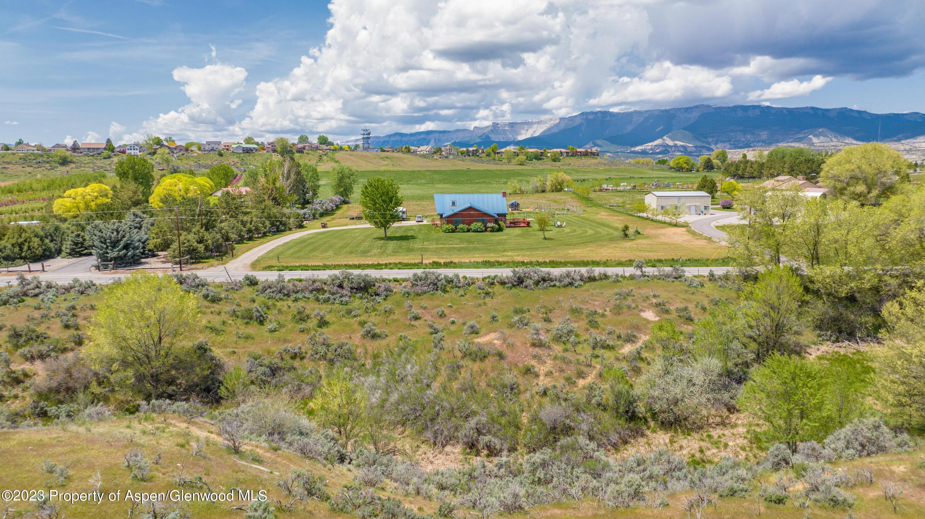 1840 County Road 293 Rifle, CO 81650 - Photo 9 of 27 a view of a lake with houses in the back