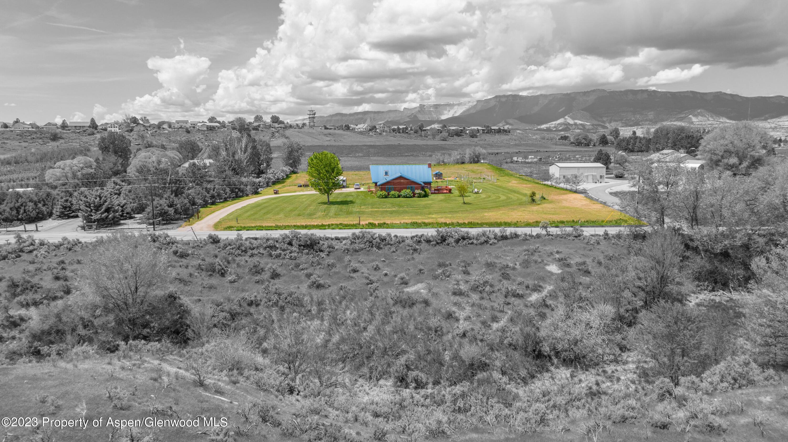 1840 County Road 293 Rifle, CO 81650 - Photo 10 of 27 a view of a backyard with swimming pool