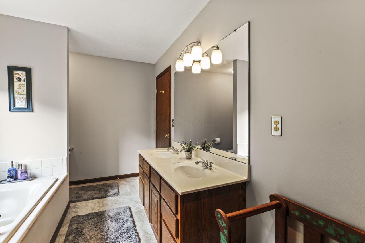 1550 Swans Road Northeast Newark, OH 43055 - Photo 35 of 65 Main Bedroom Bathroom Sink