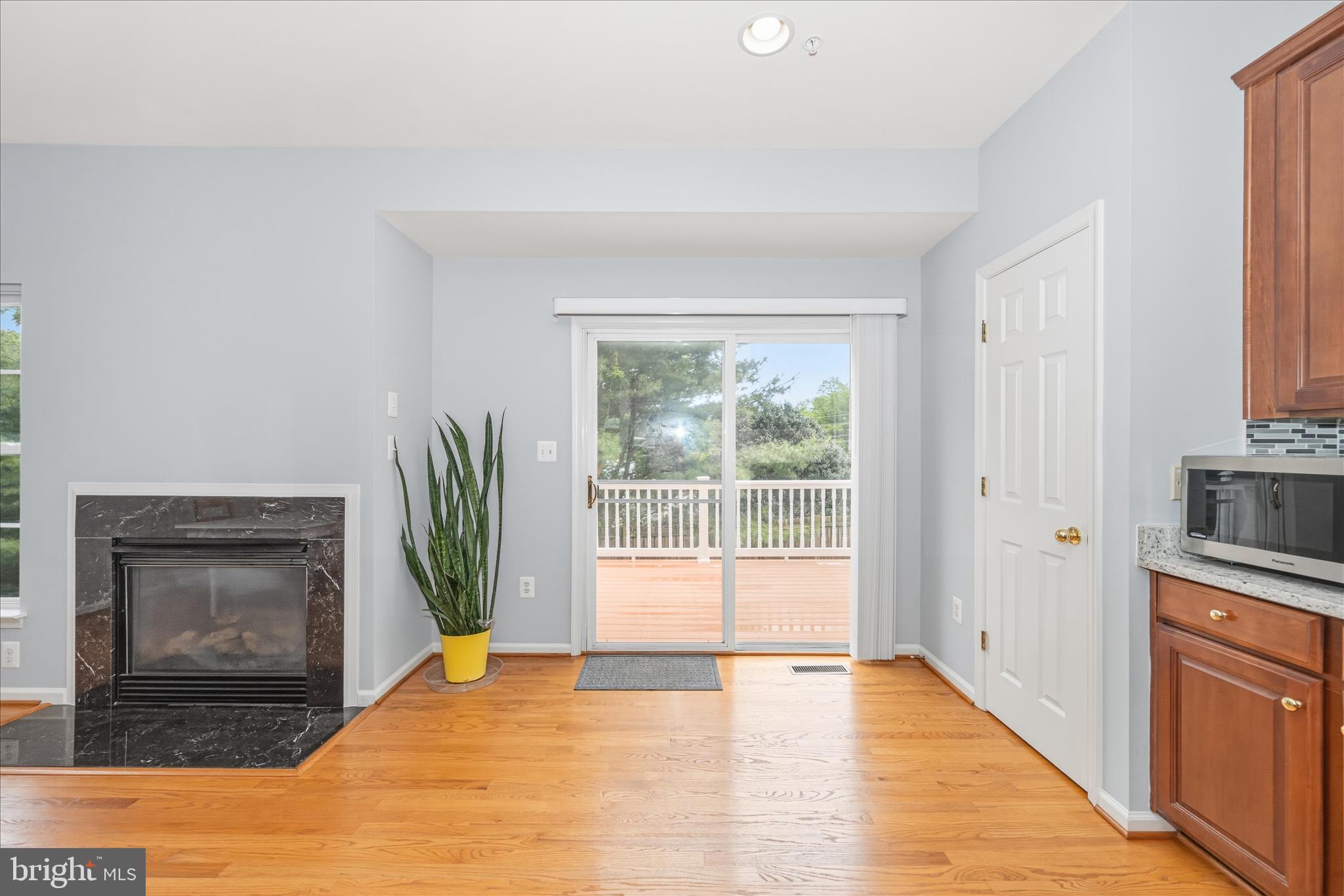 21 Inkberry Circle Gaithersburg, MD 20877 - Photo 22 of 51 a view of an empty room with a fireplace and a window