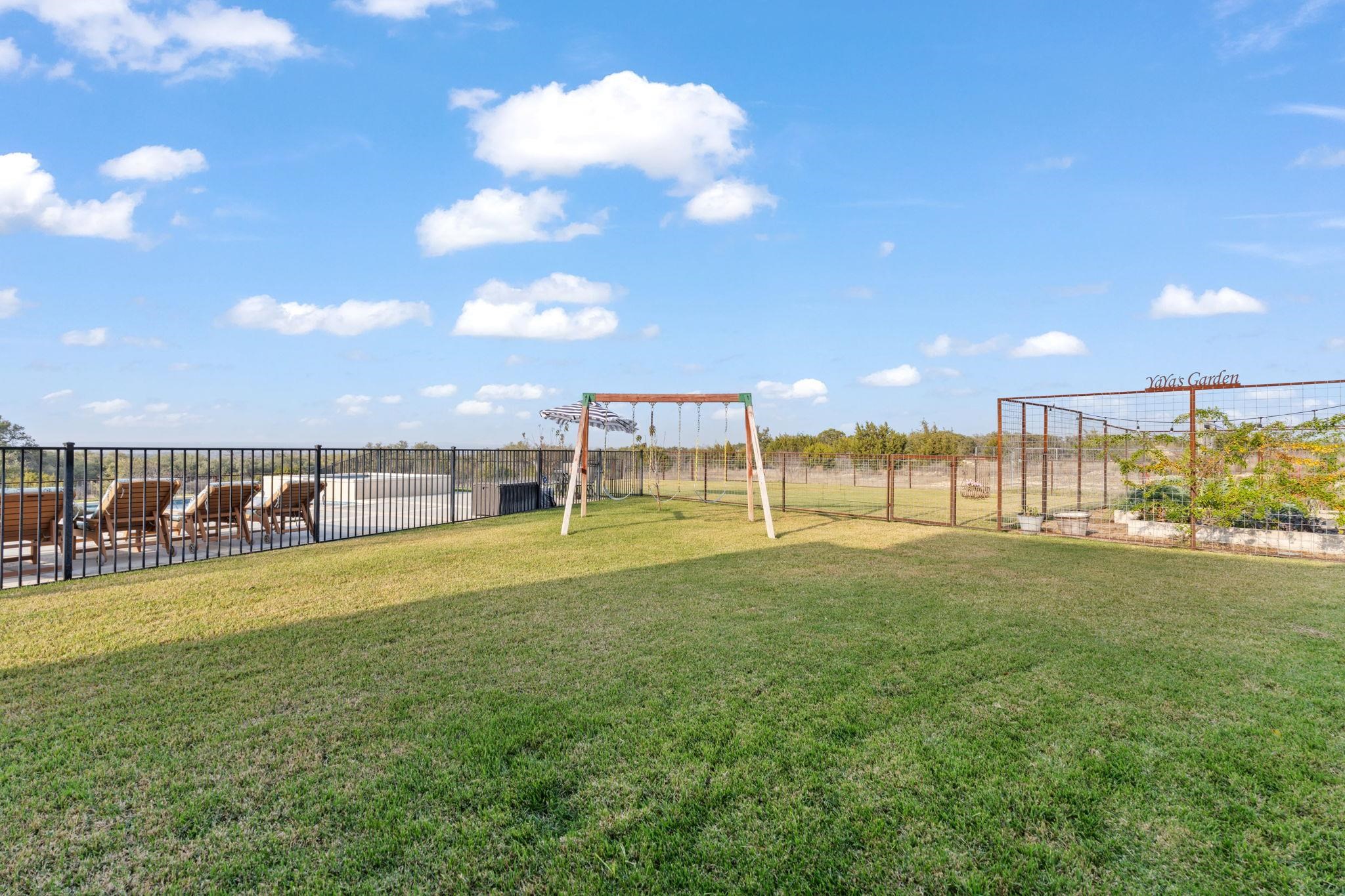 452 Southwick Ranch Road Johnson City, TX 78636 - Photo 30 of 44 a view of a garden