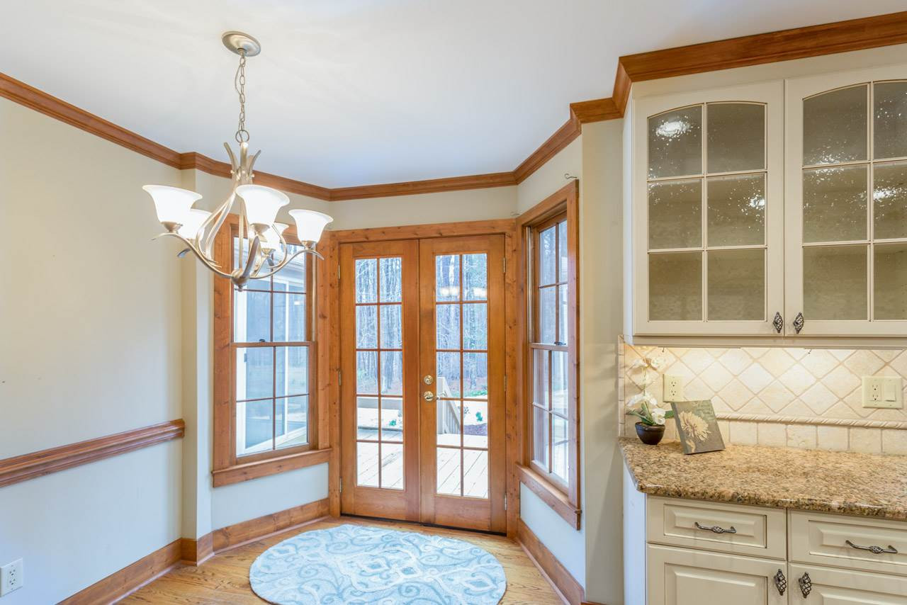 This view also shows two glass door cabinets Breakfast Nook