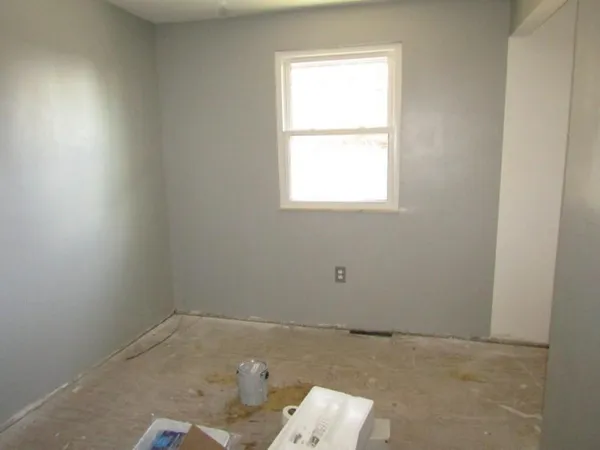 an empty room with a window