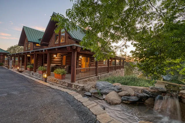 a kitchen with lots of counter top space and dining table