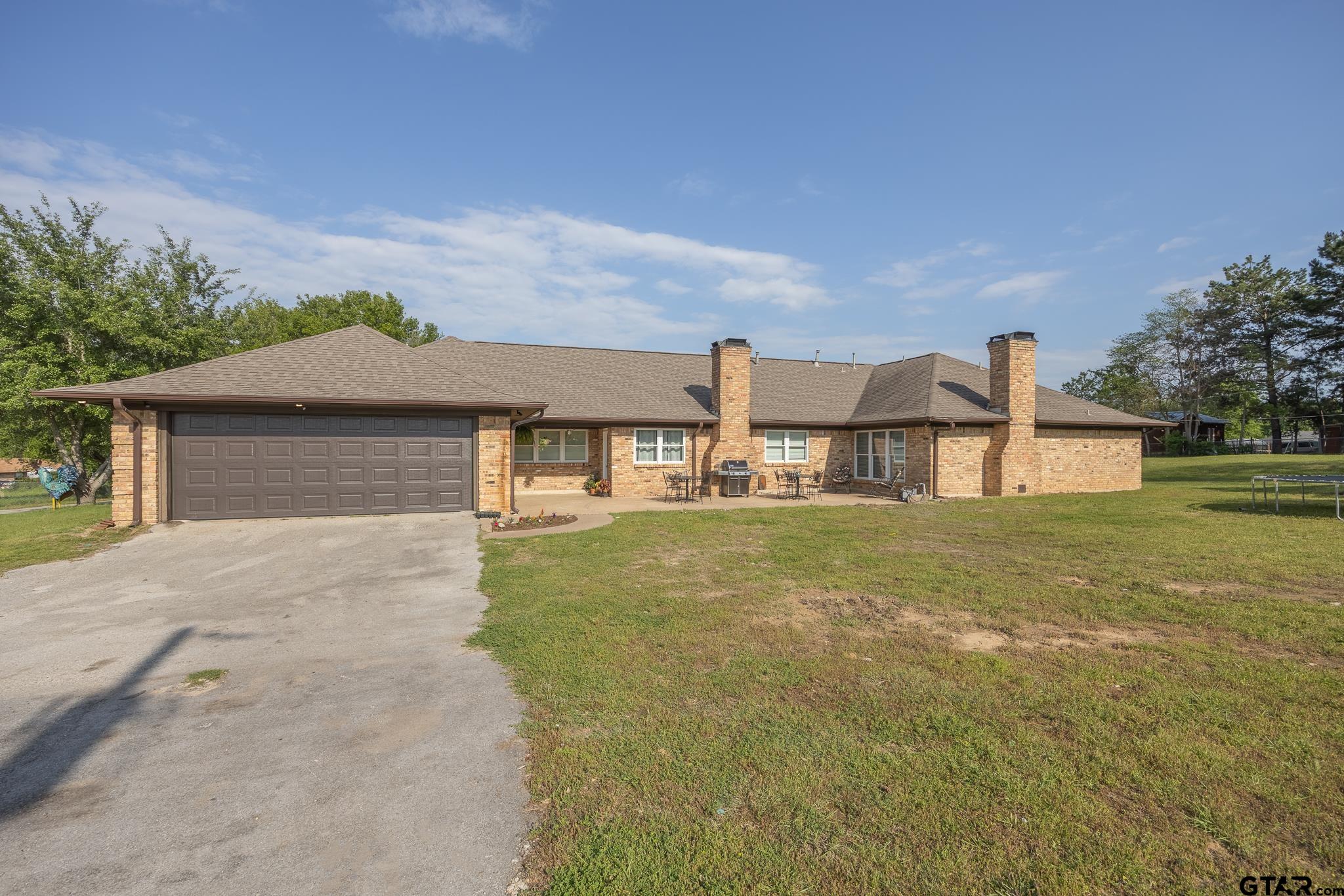 2201 Ridgley Tyler, TX 75703 - Photo 37 of 42 a front view of a house with garden