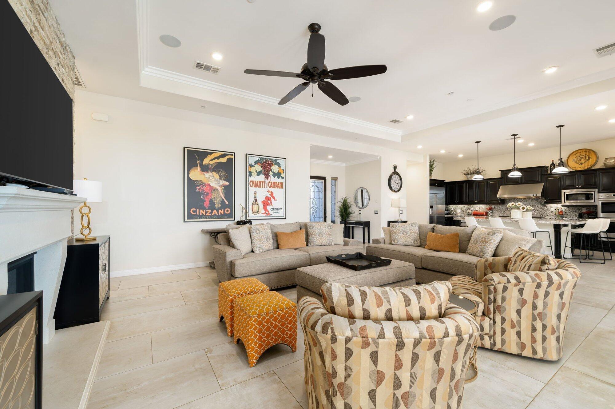 81675 Macbeth Street La Quinta, CA 92253 - Photo 19 of 76 a living room with furniture and a flat screen tv