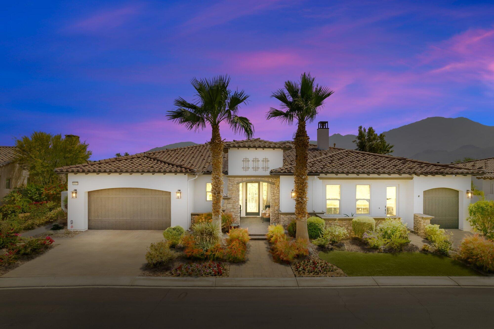 81675 Macbeth Street La Quinta, CA 92253 - Photo 3 of 76 a front view of a house with a yard and garage