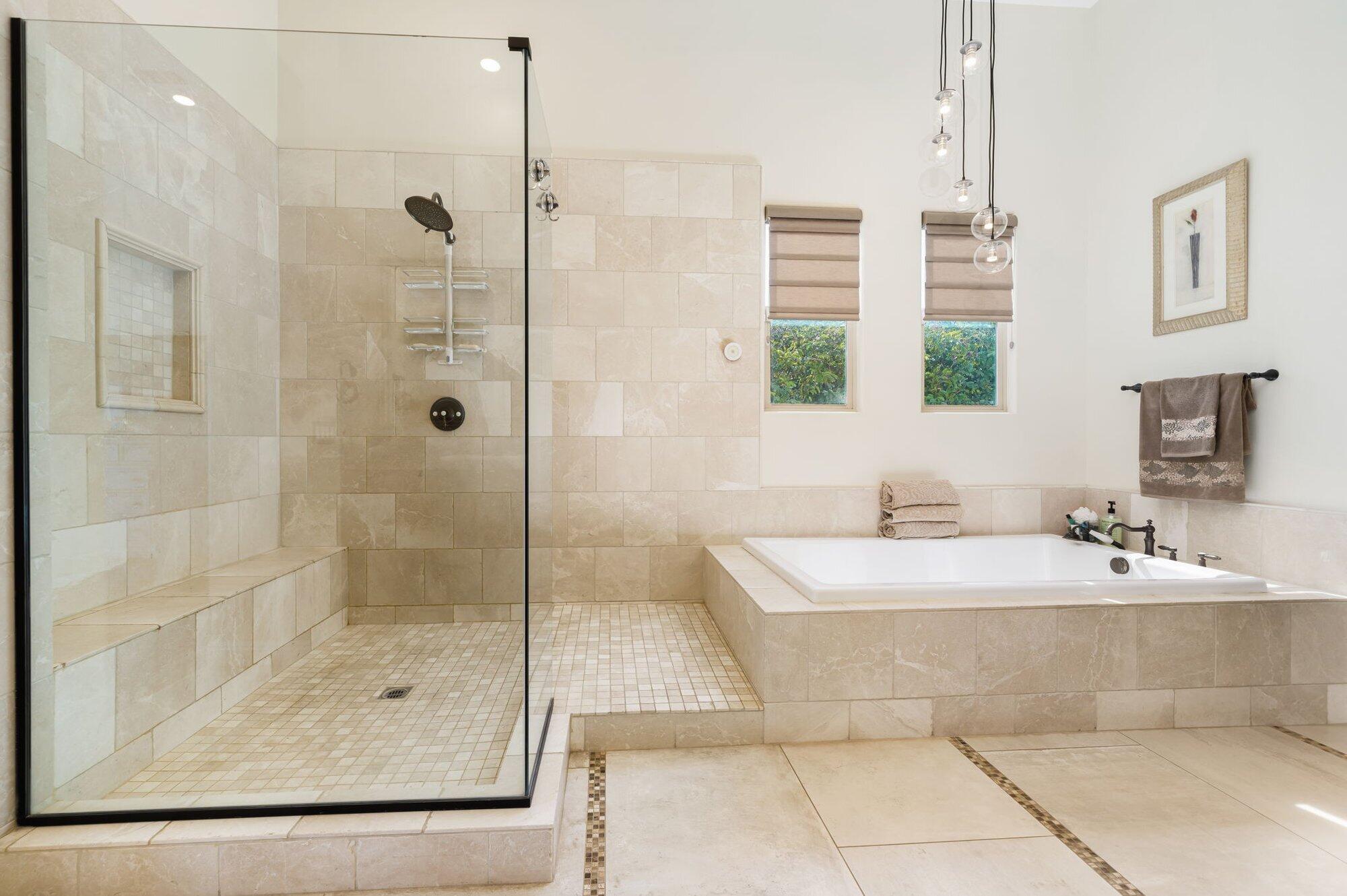 81675 Macbeth Street La Quinta, CA 92253 - Photo 40 of 76 a bathroom with a shower a sink and a mirror