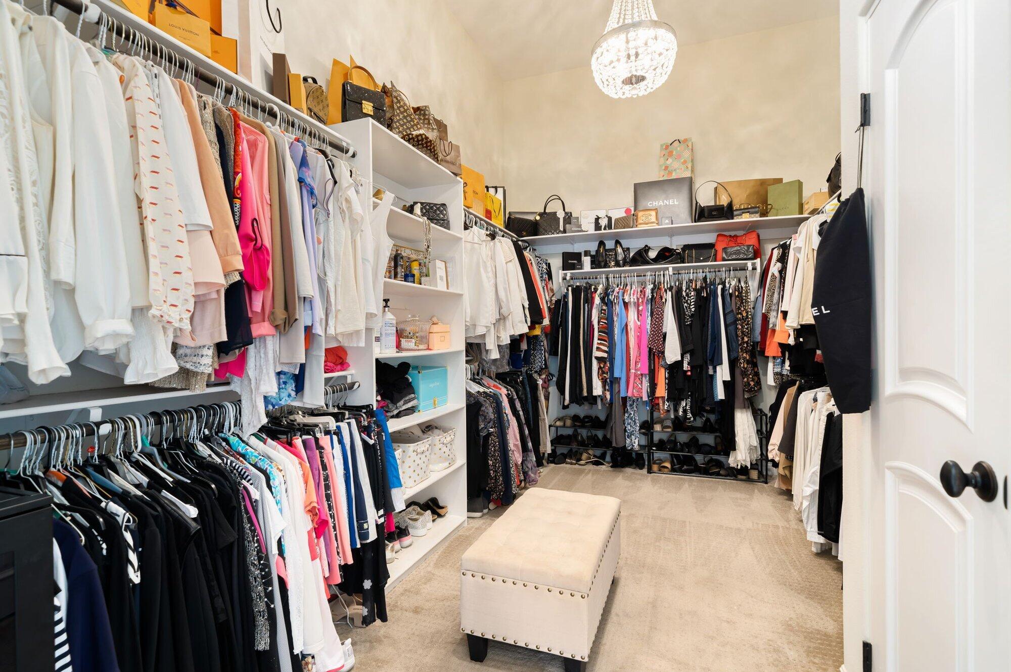 81675 Macbeth Street La Quinta, CA 92253 - Photo 41 of 76 a view of walk in closet with clothes