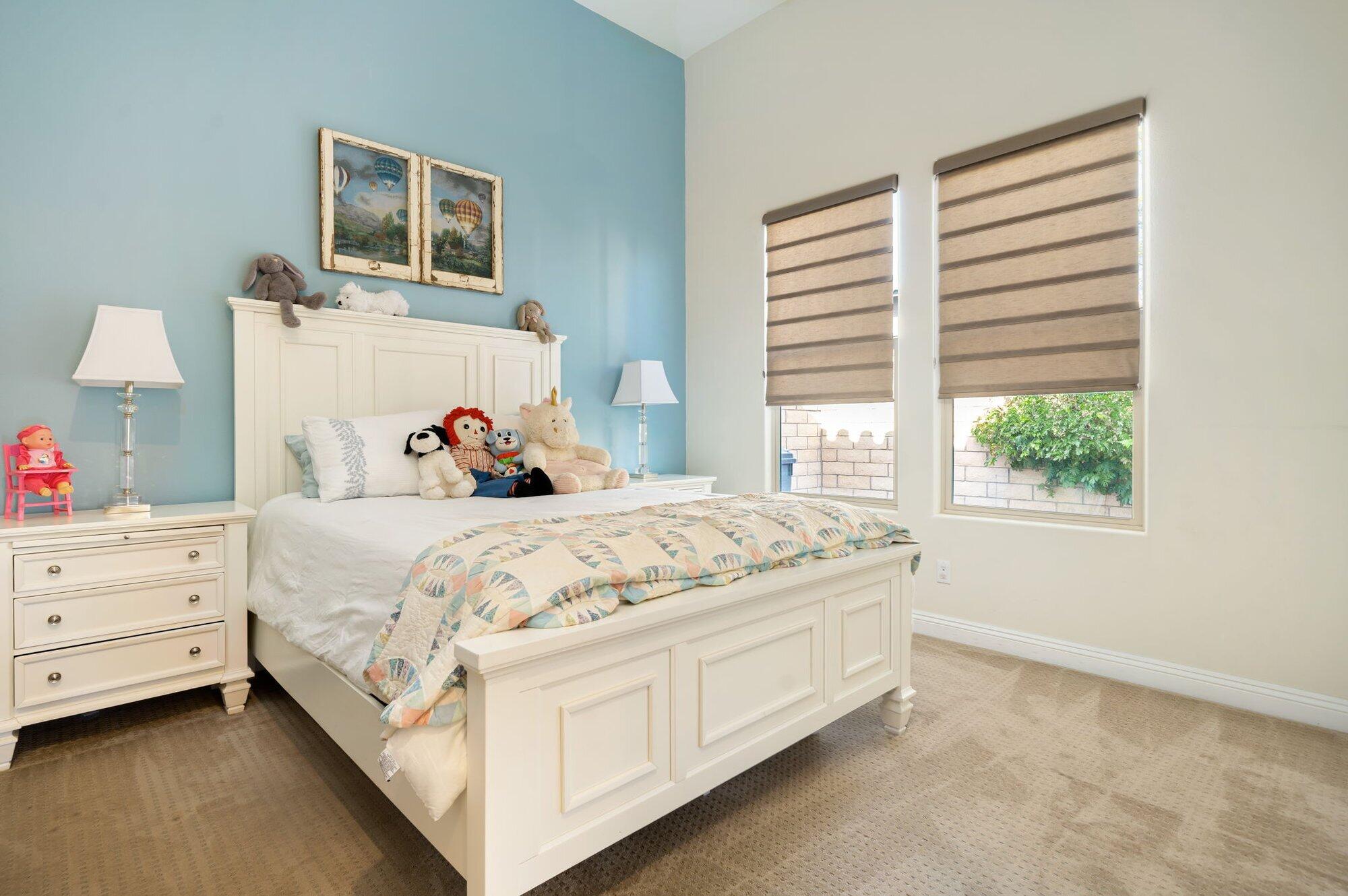 81675 Macbeth Street La Quinta, CA 92253 - Photo 50 of 76 a bed room with a bed and a window