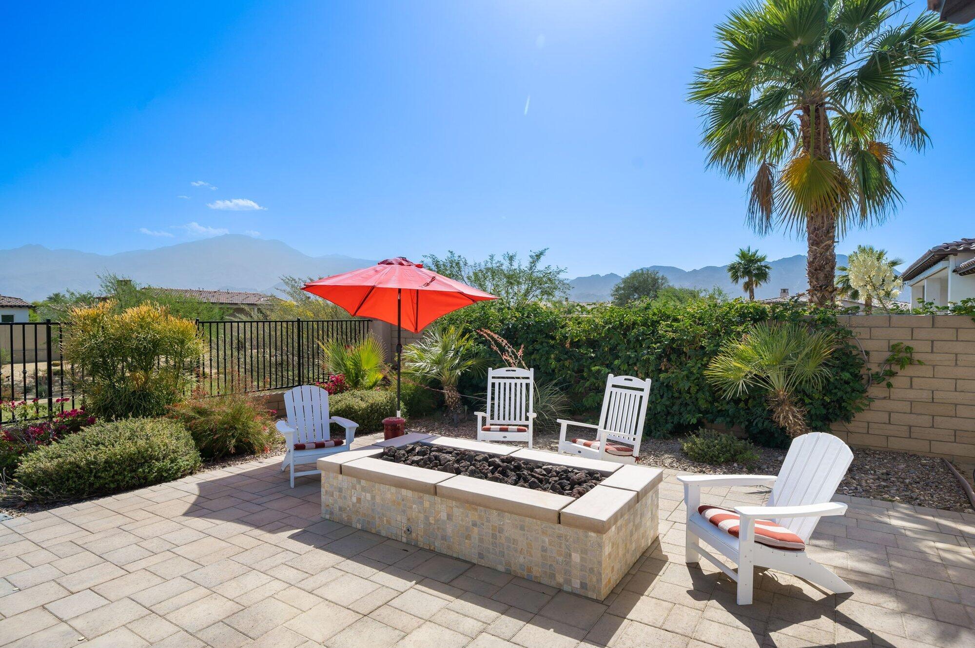81675 Macbeth Street La Quinta, CA 92253 - Photo 5 of 76 a view of a terrace with couches and wooden fence