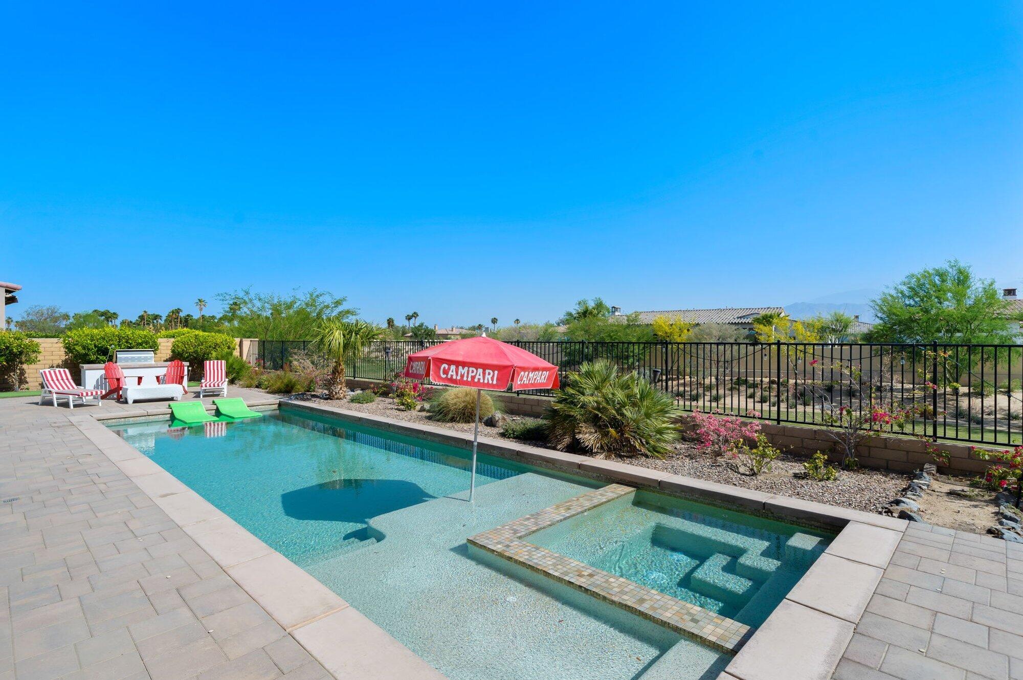 81675 Macbeth Street La Quinta, CA 92253 - Photo 6 of 76 a view of swimming pool with a patio and a garden