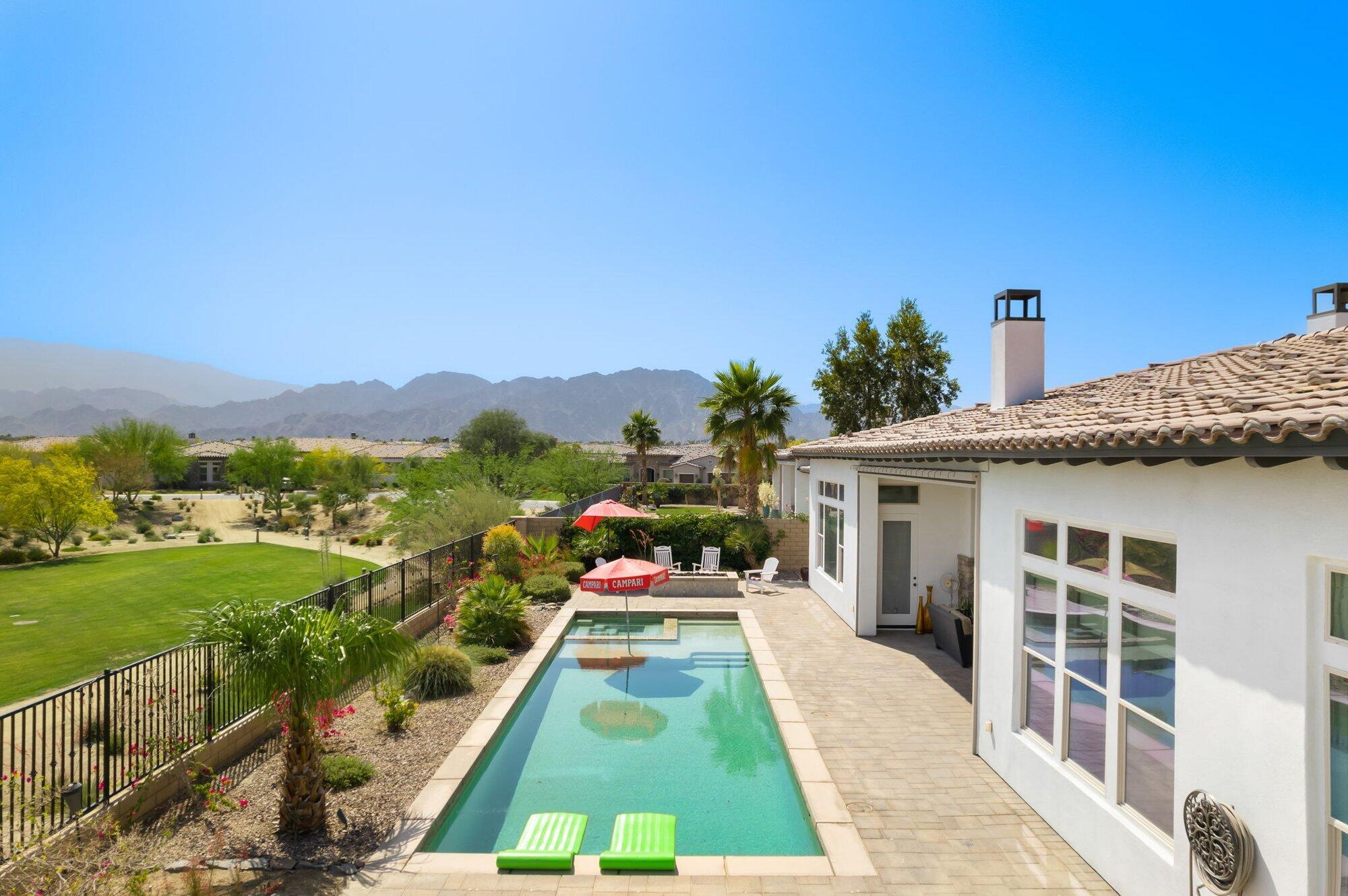 81675 Macbeth Street La Quinta, CA 92253 - Photo 10 of 76 a view of a house with a yard