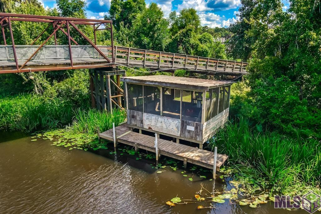 20878 Diversion Canal Road, Unit 1 St. Amant, LA 70774 - Photo 19 of 34 Waterfront Cabin Included!