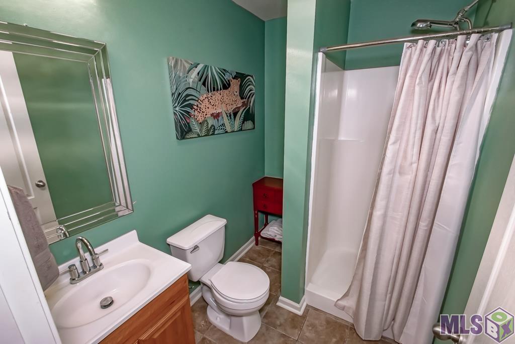20878 Diversion Canal Road, Unit 1 St. Amant, LA 70774 - Photo 9 of 34 Hall Bath