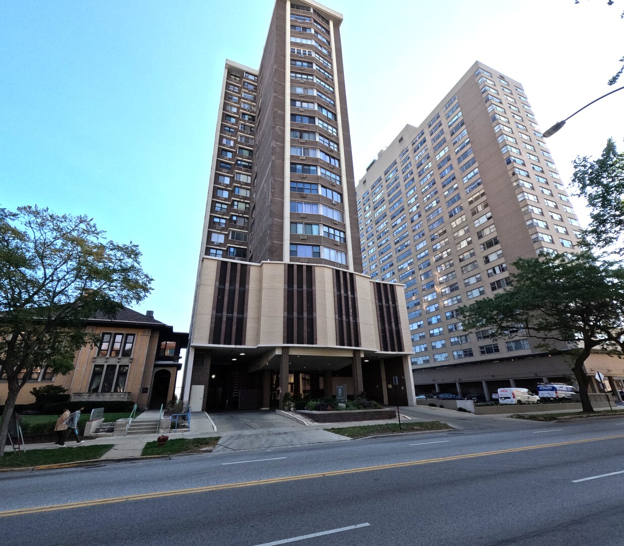 6325 North Sheridan Road, Unit 2003 Chicago, IL 60660 - Photo 1 of 17 a view of a tall building next to a road