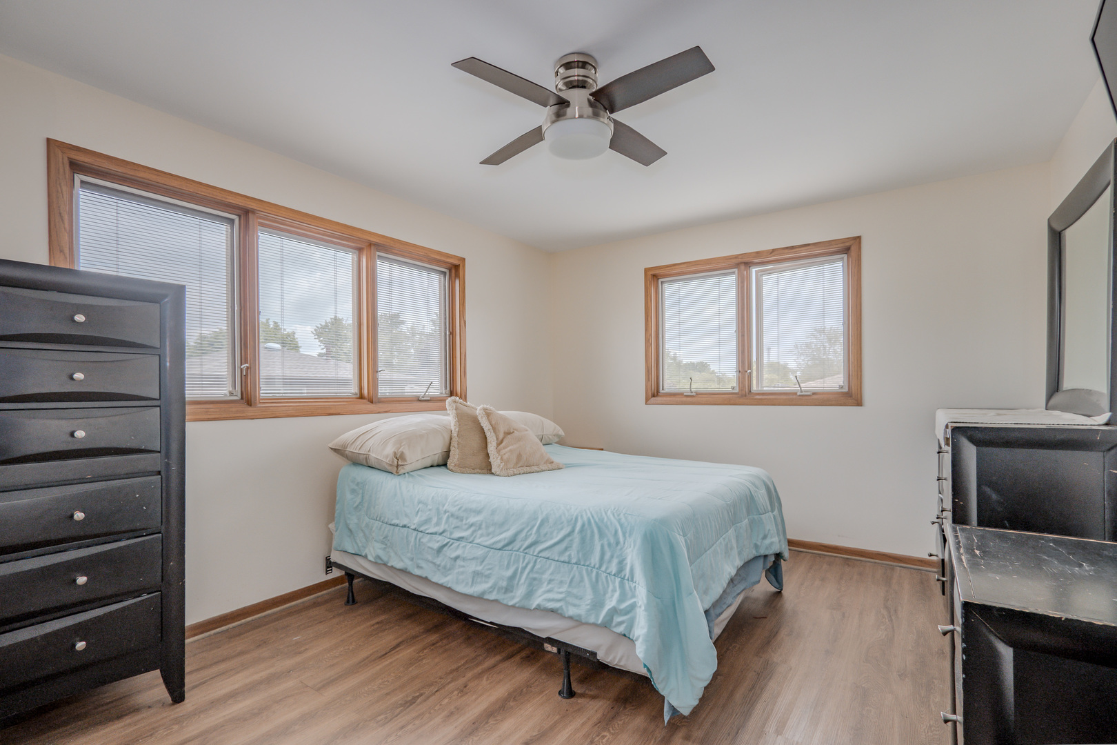 8440 Anvil Place Tinley Park, IL 60487 - Photo 12 of 18 a bedroom with a bed and window