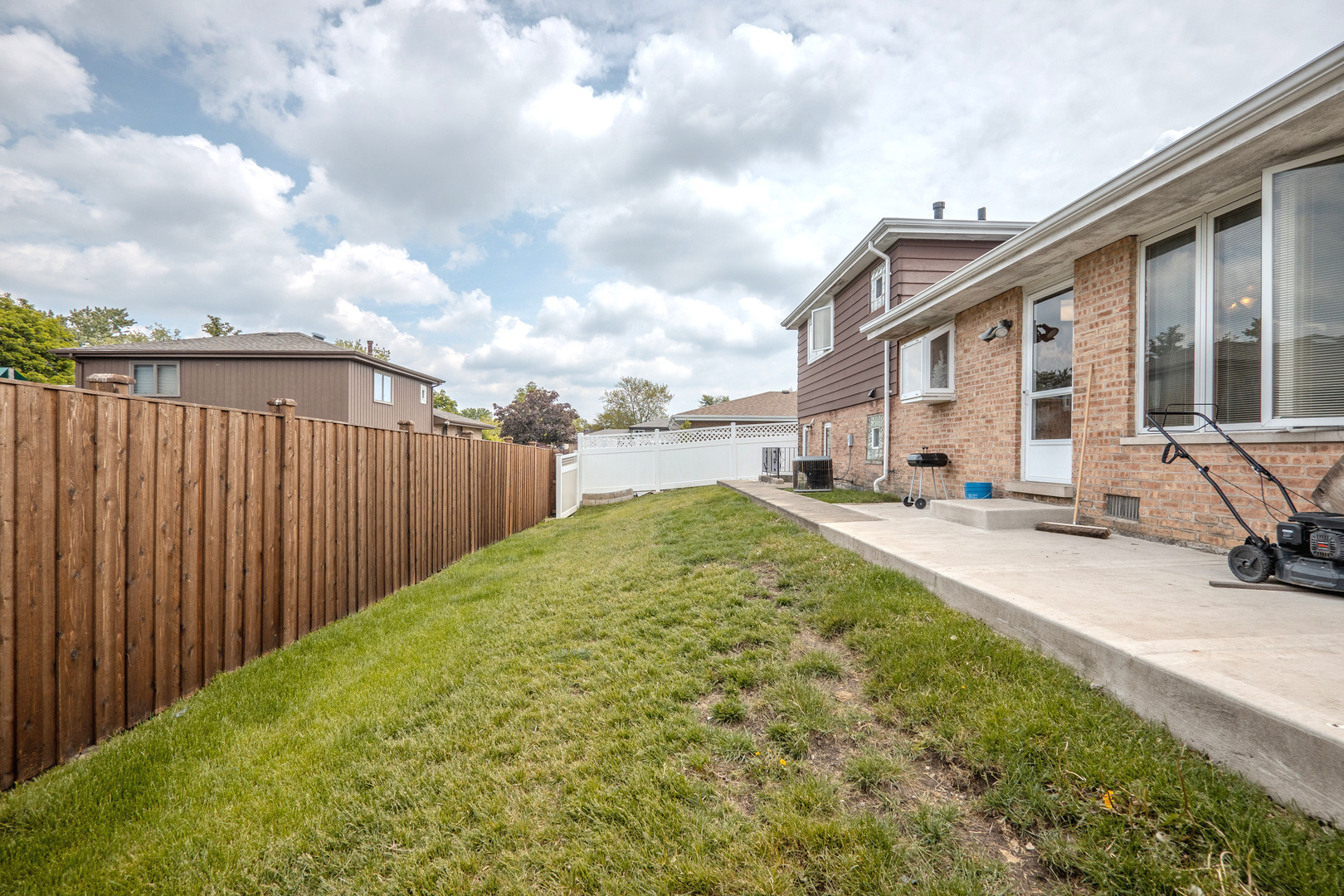 8440 Anvil Place Tinley Park, IL 60487 - Photo 16 of 18 a view of backyard with swimming pool and furniture