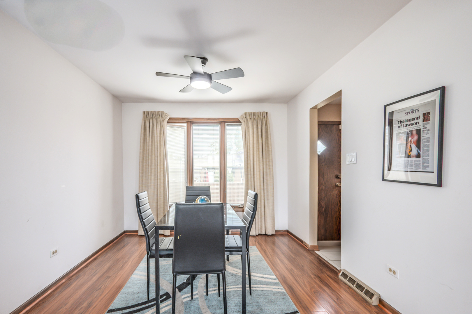 8440 Anvil Place Tinley Park, IL 60487 - Photo 6 of 18 a view of a dining room with furniture window and wooden floor