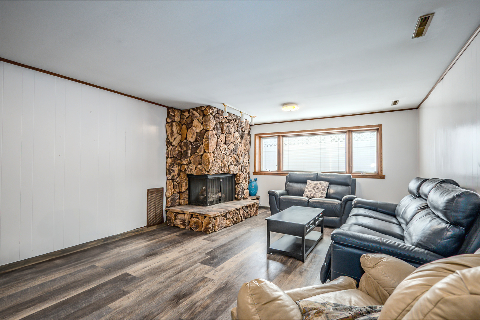 8440 Anvil Place Tinley Park, IL 60487 - Photo 8 of 18 a living room with furniture and a flat screen tv