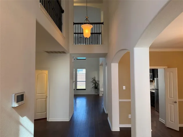 workspace with wooden floor mirror and stairs