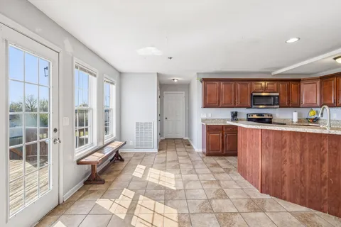 a view of livingroom with furniture wooden floor and window