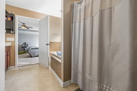 a bathroom with a sink a toilet and a bathtub