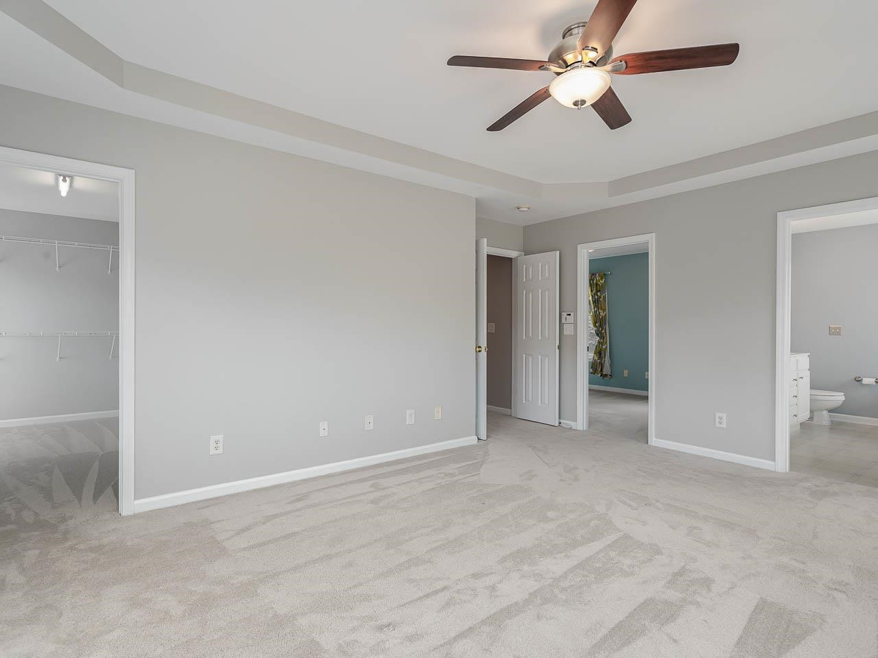 3702 Appling Way Durham, NC 27703 - Photo 13 of 34 a view of an empty room and chandelier fan