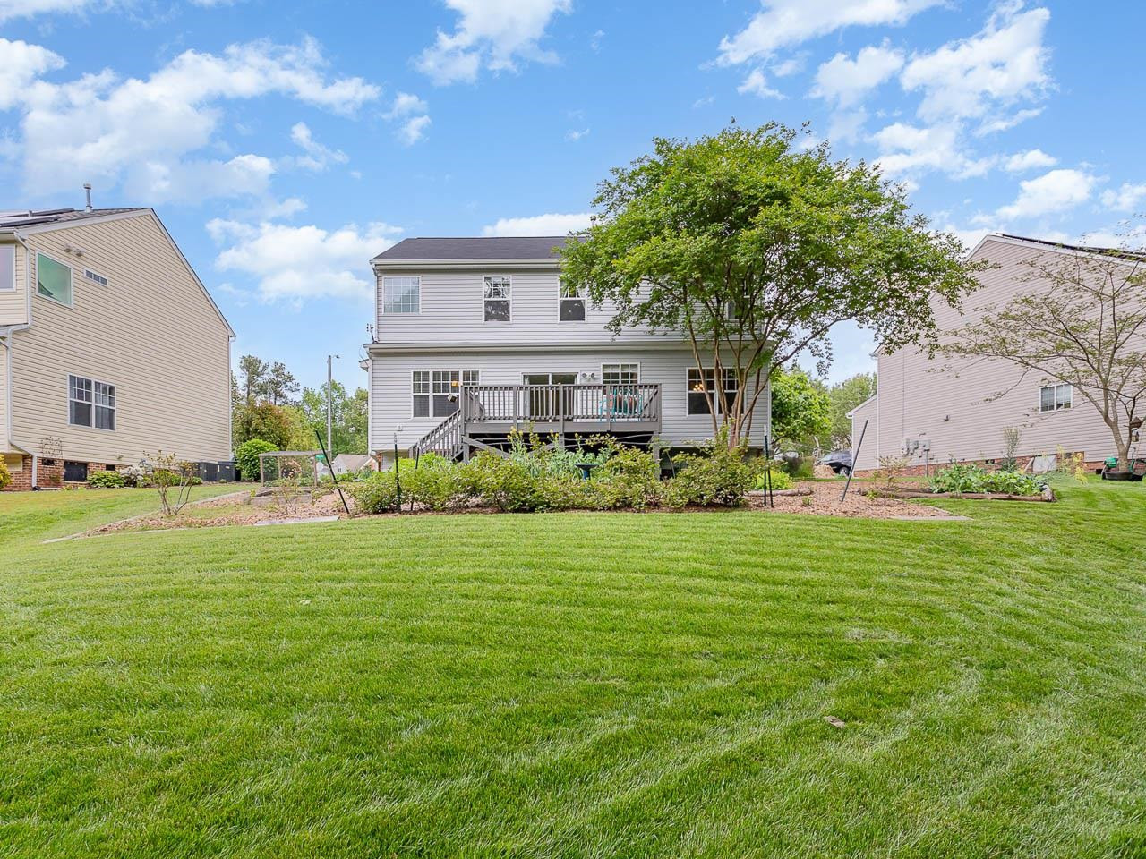 3702 Appling Way Durham, NC 27703 - Photo 25 of 34 a front view of a house with garden