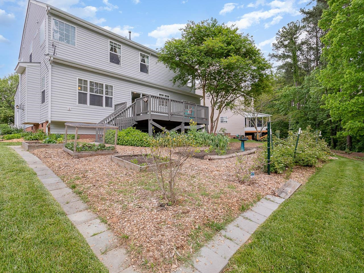 3702 Appling Way Durham, NC 27703 - Photo 27 of 34 a front view of a house with garden