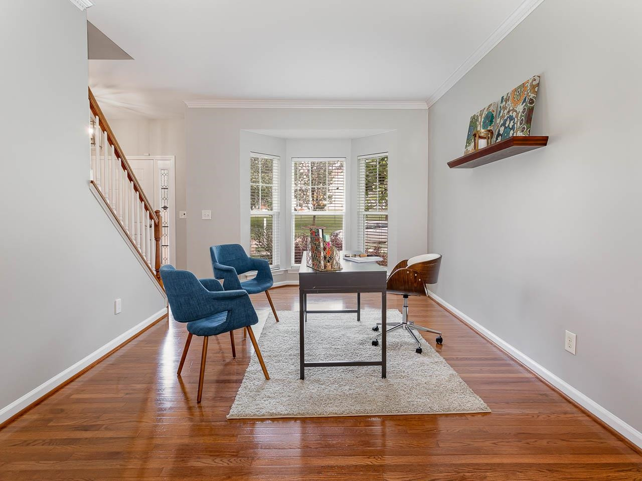 3702 Appling Way Durham, NC 27703 - Photo 3 of 34 a living room with furniture and a wooden floor