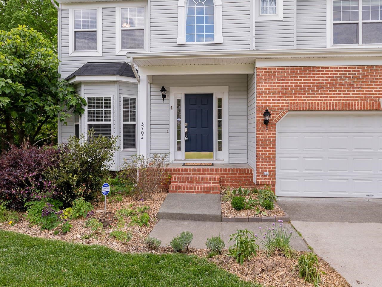 3702 Appling Way Durham, NC 27703 - Photo 31 of 34 a front view of a house with garden