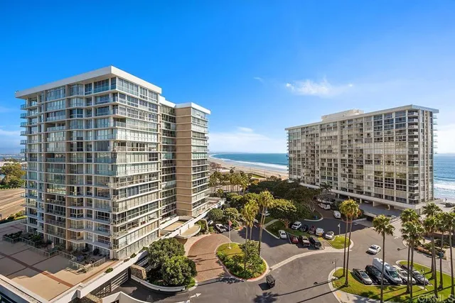 a view of a city with tall buildings