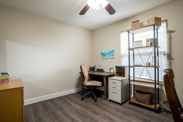 a view of a workspace with furniture