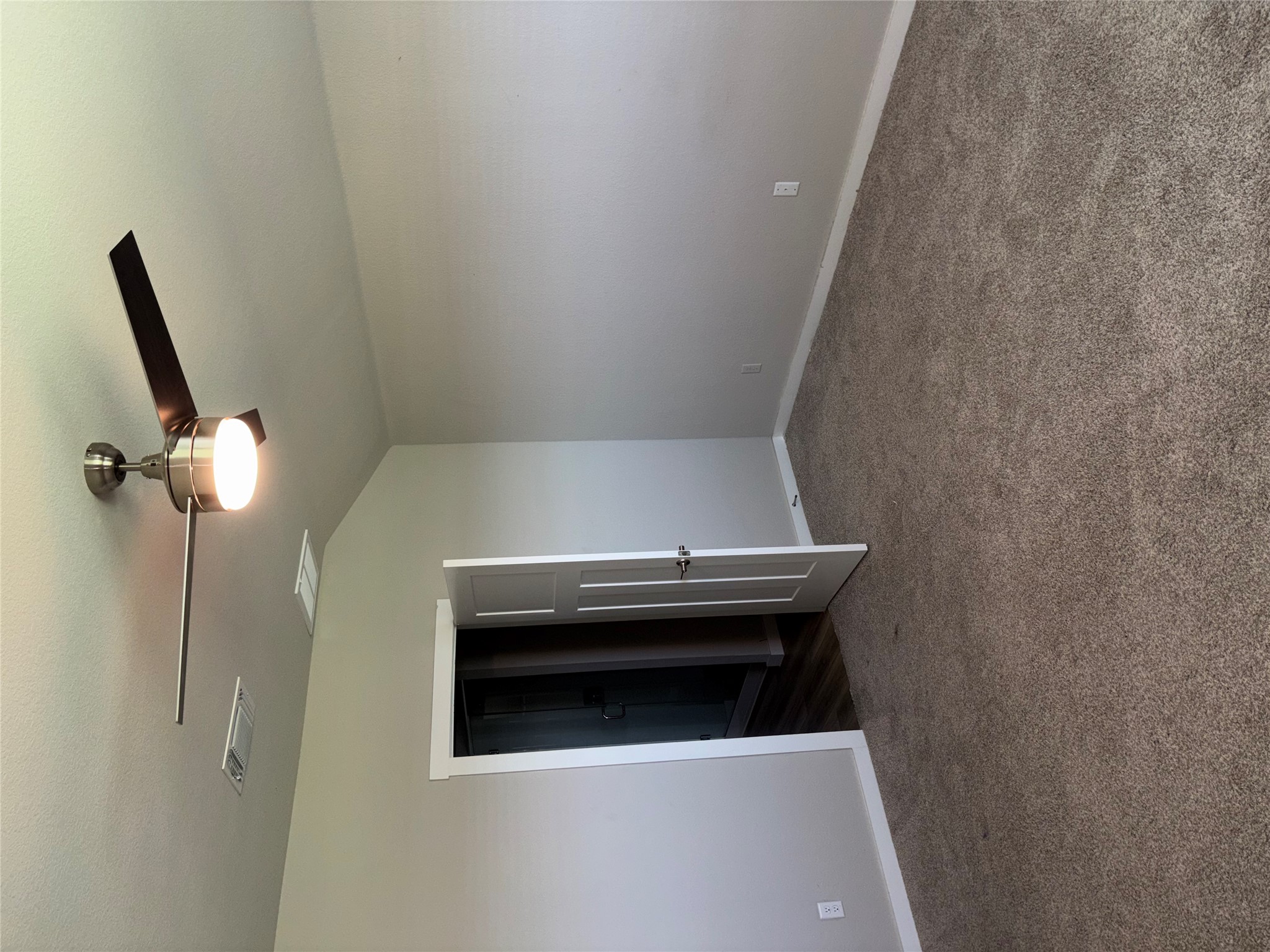 301 Tarkus Path Georgetown, TX 78633 - Photo 21 of 33 A quiet bedroom featuring vaulted ceilings and soft carpeting, offering a private retreat.