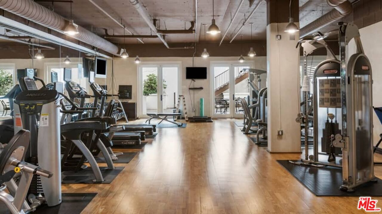 261 South Reeves Drive Beverly Hills, CA 90212 - Photo 34 of 43 a view of a room with gym equipment