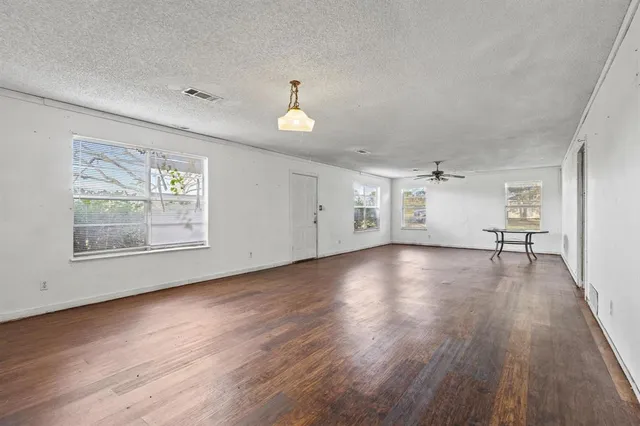 a view of livingroom with hardwood floor and window