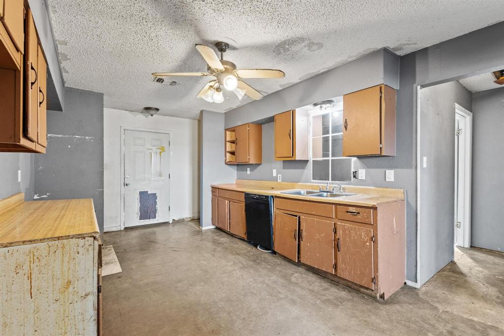 1206 Farm To Market 902 Howe, TX 75459 - Photo 8 of 23 a spacious bathroom with a granite countertop sink a mirror and a bathtub