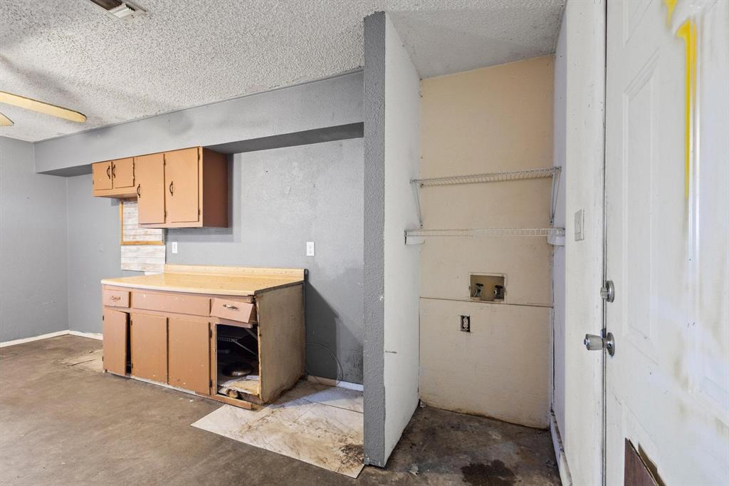 1206 Farm To Market 902 Howe, TX 75459 - Photo 10 of 23 a bathroom with a sink dryer and washer