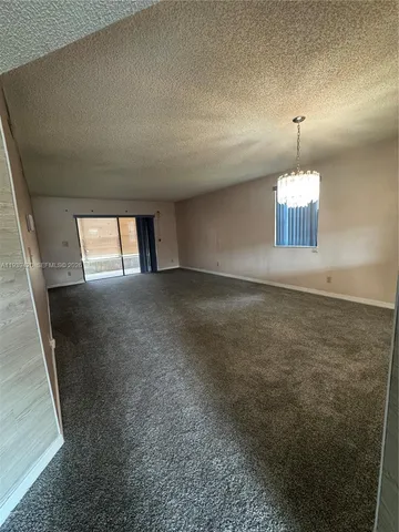 wooden floor in a hall with an entryway
