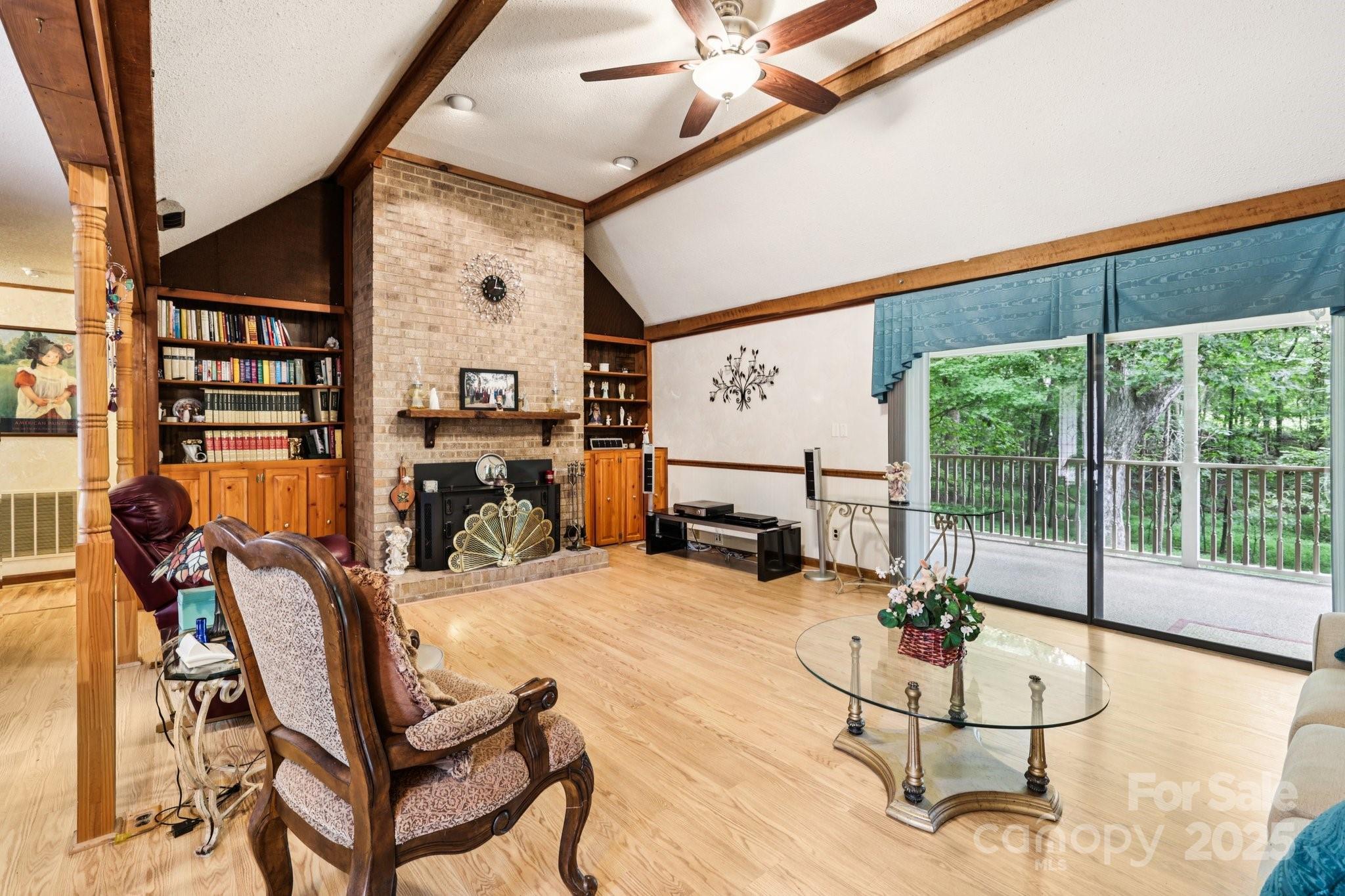 27 Search Drive Concord, NC 28025 - Photo 6 of 26 a living room with furniture gym equipment and a large window