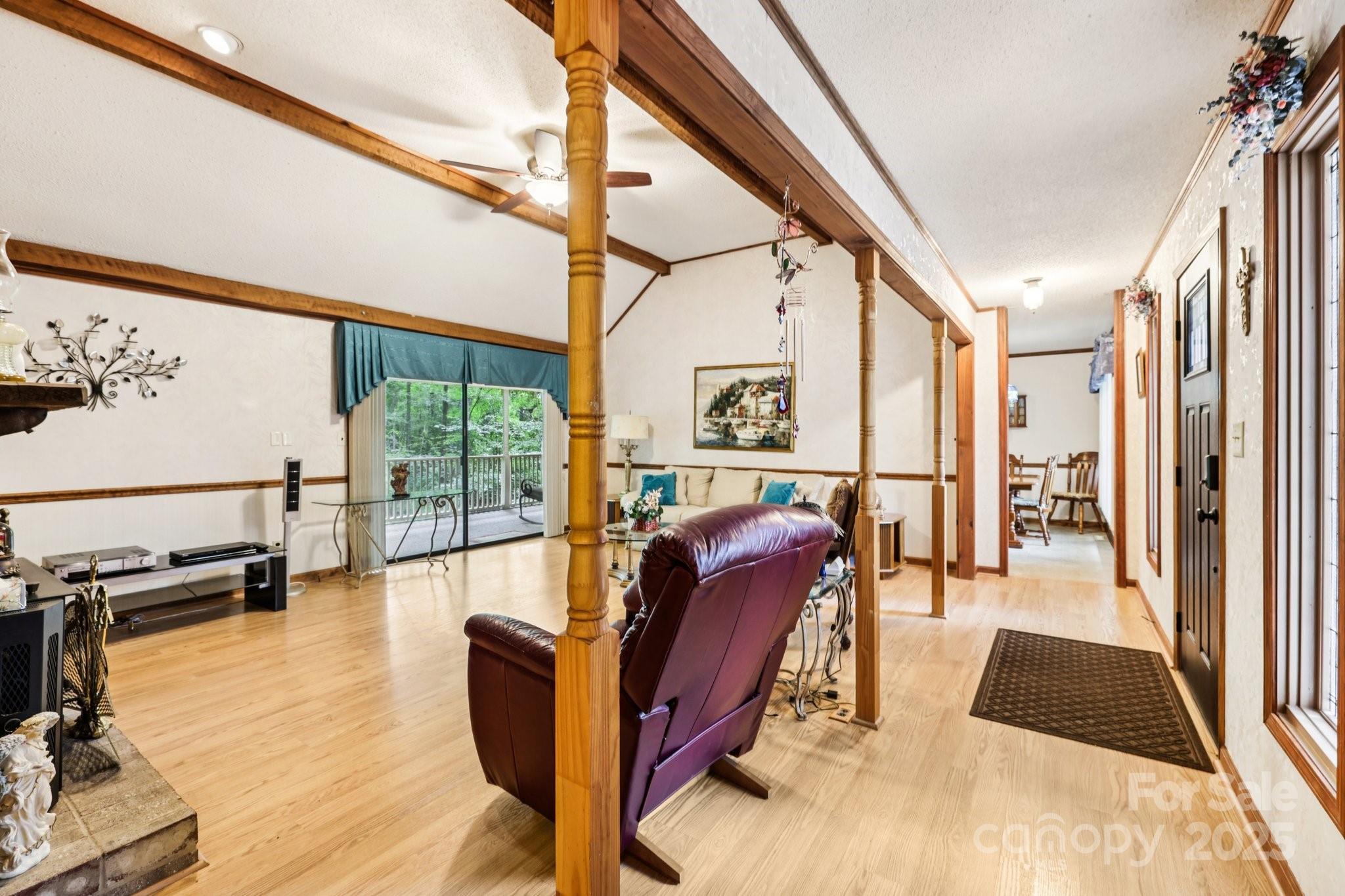 27 Search Drive Concord, NC 28025 - Photo 7 of 26 a living room with furniture and a floor to ceiling window