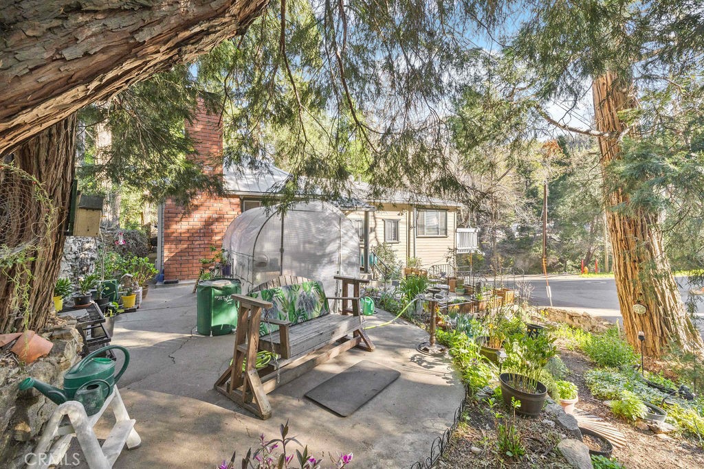 23328 Brookside Road Crestline, CA 92325 - Photo 11 of 40 a view of yard with patio